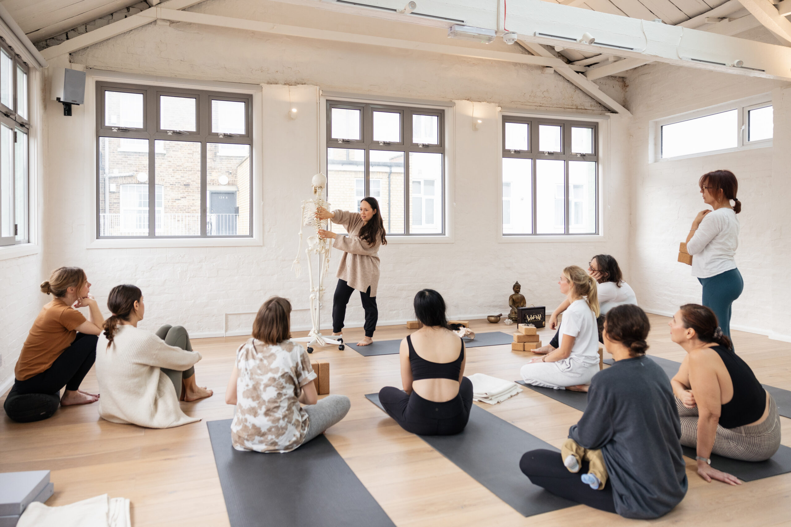 Hana Saotome teaching yoga the BWY Yoga teacher training in London